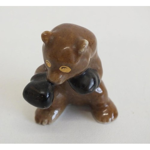 314 - 1950's GLAZED CERAMIC ORNAMENT BEAR WEARING BOXING GLOVES, 5.5cm Height