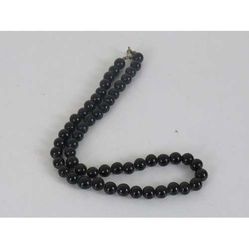 319 - TWO BLACK GLASS BEADED NECKLACES