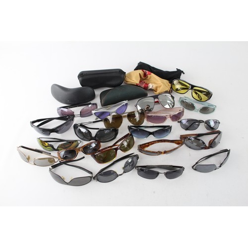 451 - Over 20 Pairs of Sunglasses and Cases