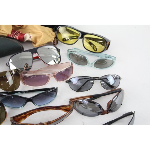 451 - Over 20 Pairs of Sunglasses and Cases