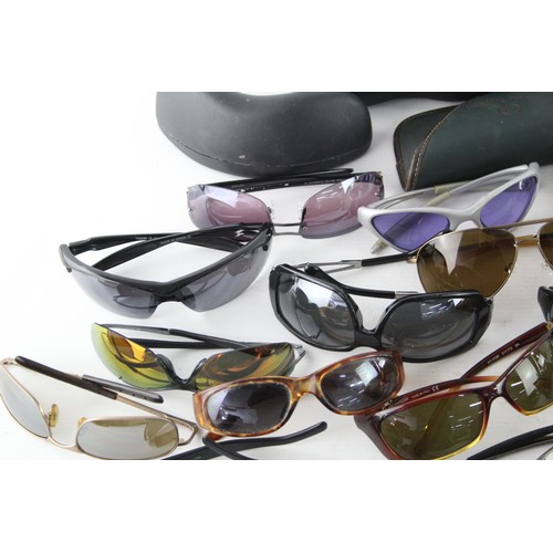 451 - Over 20 Pairs of Sunglasses and Cases