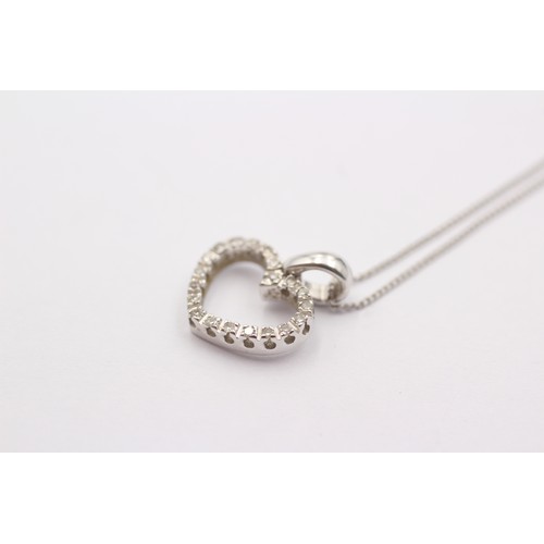 640 - 9ct white gold diamond set open heart pendant necklace (1.9g)