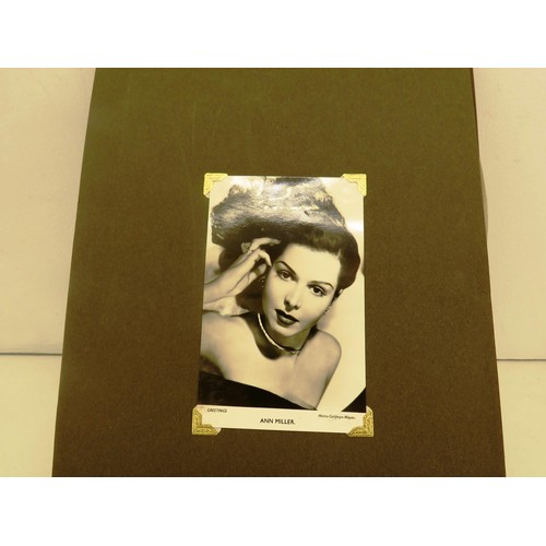 54 - ALBUM OF POSTCARDS- MOSTLY FAMOUS PERSONALITIES INCLUDES DORIS DAY, TONY MARTIN ETC