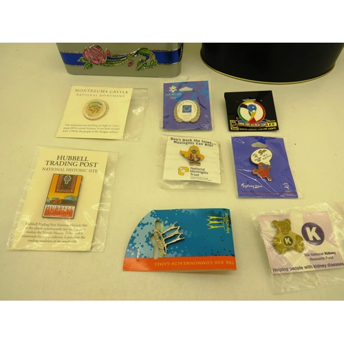 56 - TWO TINS FULL OF COLLECTABLE PIN BADGES INCLUDES OLYMPICS AND CHARITIES