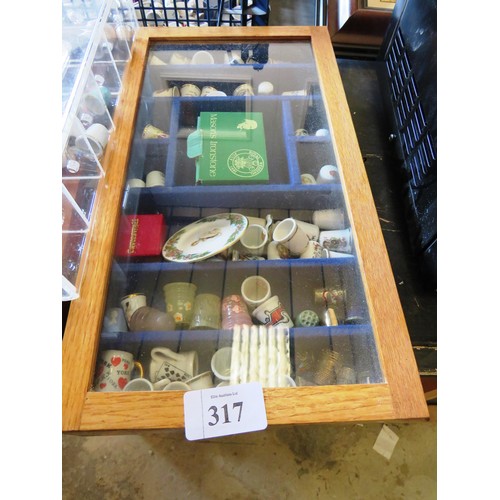 317 - JOBLOT OF THIMBLES, MINIATURE CUP AND SAUCERS, TWO WOOD AND GLASS DISPLAY CABINETS AND PERSPEX DISPL... 