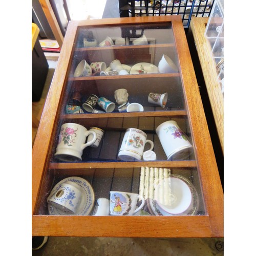 317 - JOBLOT OF THIMBLES, MINIATURE CUP AND SAUCERS, TWO WOOD AND GLASS DISPLAY CABINETS AND PERSPEX DISPL... 