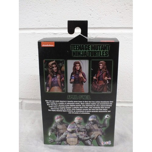 30 - NECA Teenage Mutant Ninja Turtles Ultimate April O'Neil 1990 Movie Action Figure - Boxed as New