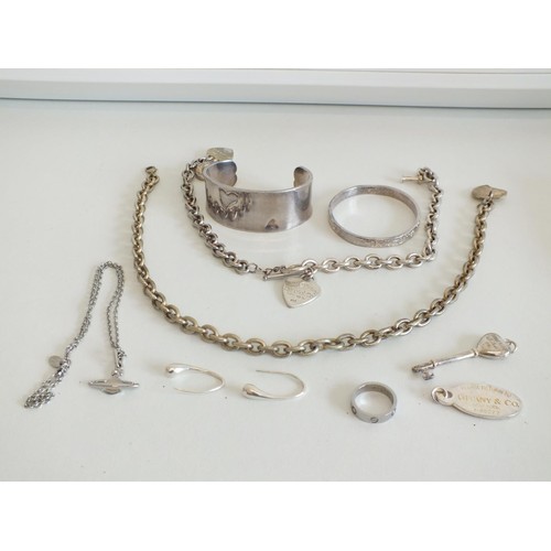 149 - SILVERTONE FASHION JEWELLERY INCLUDES BANGLES, PENDANT ETC