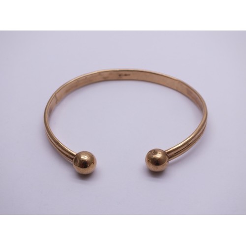 285 - 9ct GOLD TORQUE BANGLE 4.4g