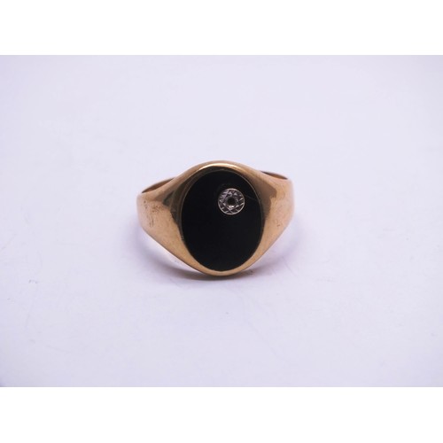 85 - 9ct GOLD BLACK ONYX SIGNET RING SIZE R, weight 3.8g