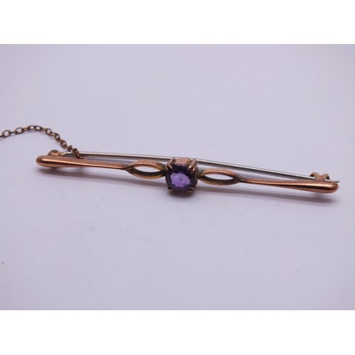 95 - VICTORIAN GOLD COLOUR BAR BROOCH SET WITH AMETHYST