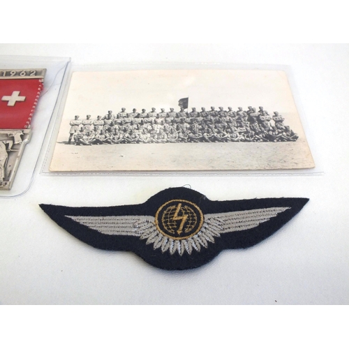 76 - WWII DEFENCE MEDAL AND SILVER AIR RAID BADGE