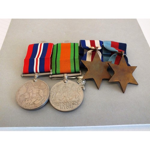 91 - WWII PARATROOP SET OF FOUR MEDALS MOUNTED WITH BADGES