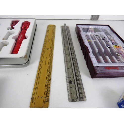 232 - TRAY LOT INCLUDES DRAWING SETS, MASTERGRIP TOOL TIN, PEN SETS, RULERS AND BRASS CALENDAR