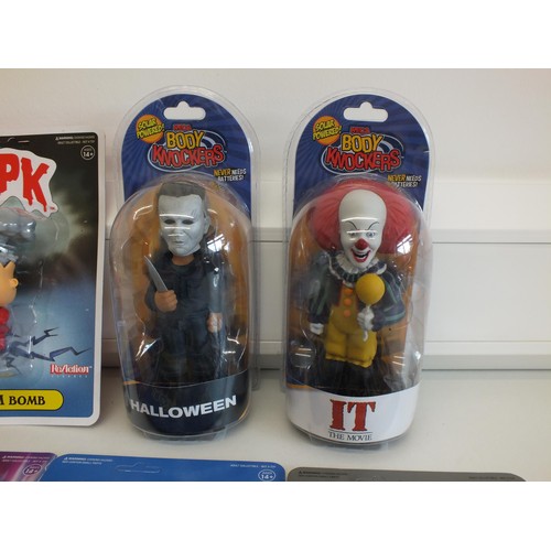 10 - COLLECTABLE FIGURES INCLUDES SUPER 7 DOC BROWN, PENNYWISE BODY KNOCKER, SUPER 7 IRON MAIDEN Etc