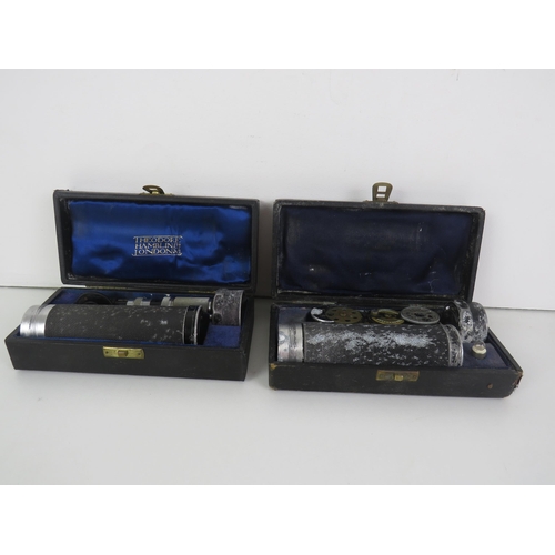 114 - TWO CASED THEODORE HAMBLIN INSTRUMENTS