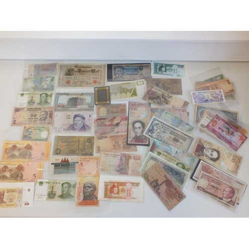 64 - 50 VARIOUS WORLD BANKNOTES