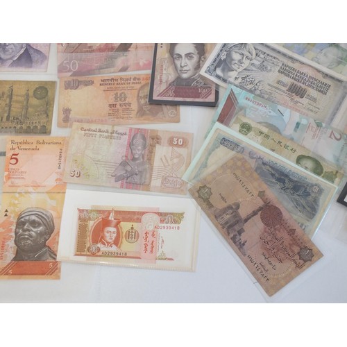 64 - 50 VARIOUS WORLD BANKNOTES