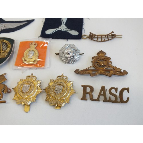 69 - 15 x VARIOUS MILITARY BRASS AND CLOTH BADGES