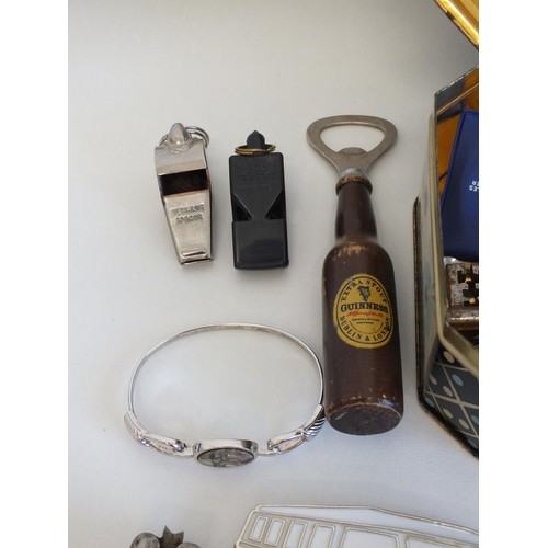 81 - OLD TIN FULL OF MISCELLANEOUS ITEMS INCLUDES VW VAN BUCKLE, GUINNESS BOTTLE OPENER