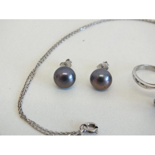 133 - SET OF SILVER AND BLACK PEARL, PENDANT NECKLACE, EAR STUDS AND RINGS