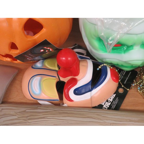 40 - SELECTION OF HALLOWEEN ITEMS INCLUDES TRICK OR TREAT CLOWN MASK, PUPKINS, TOY AXE etc