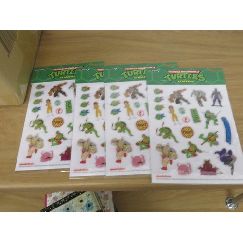 41 - 4 x SUPER 7 TEENAGE MUTANT NINJA TURTLES CASES EACH WITH ONE FIGURE AND 4 SHEETS OF NINJA TURTLES ST... 