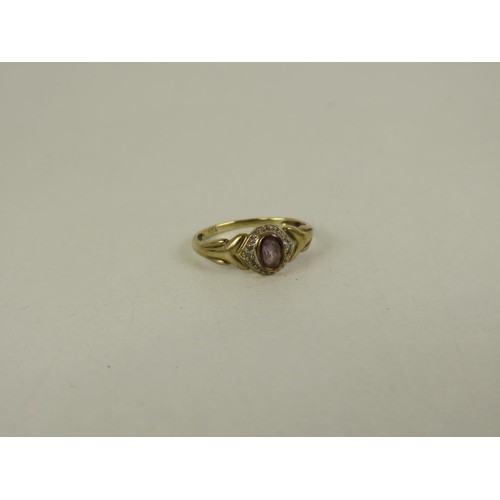 213 - 9ct GOLD DIAMOND and AMETHYST RING