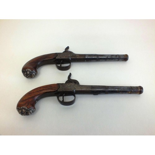 189 - PAIR OF ANTIQUE CANNON PISTOLS, HALLMARKED SILVER GROTESQUE MOUNTS DATED 1776