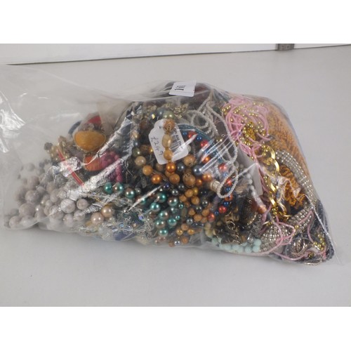 161 - LARGE BAG OF COSTUME JEWELLERY INCLUDING BRACELETS, NECKLACES ETC