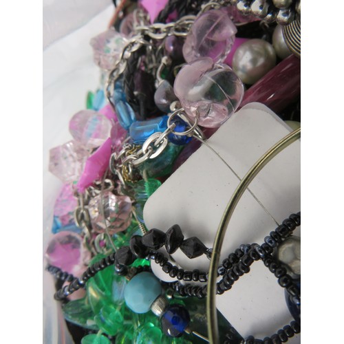 380 - OVER 5kg OF UNSORTED COSTUME JEWELLERY