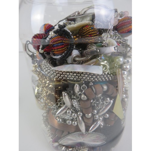 384 - PLASTIC JAR FULL OF JEWELLERY