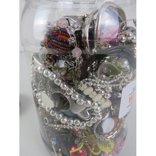 384 - PLASTIC JAR FULL OF JEWELLERY