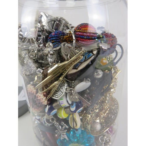 384 - PLASTIC JAR FULL OF JEWELLERY