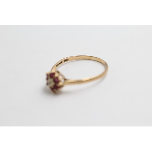 11 - 9ct Gold Diamond & Ruby Floral Cluster Ring (1.4g)- Size R