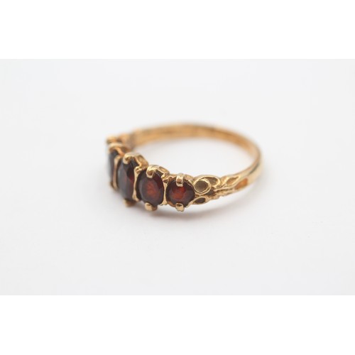 33 - 9ct Gold Garnet Five Stone Ring (2.5g)- Size Q