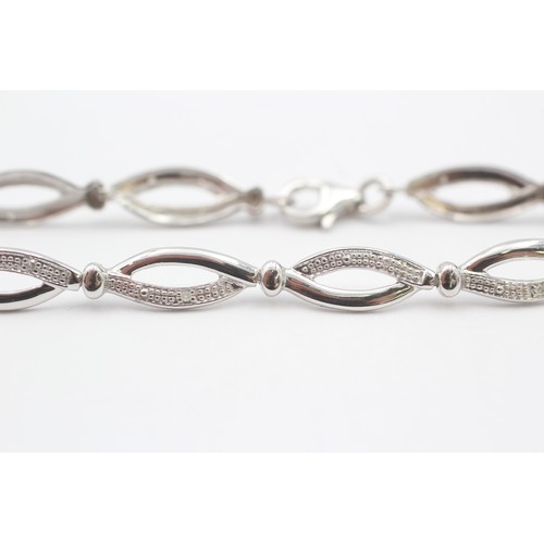 45 - 9ct White Gold Diamond Fancy Link Bracelet (3.5g)