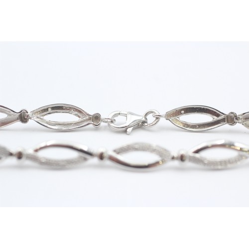 45 - 9ct White Gold Diamond Fancy Link Bracelet (3.5g)