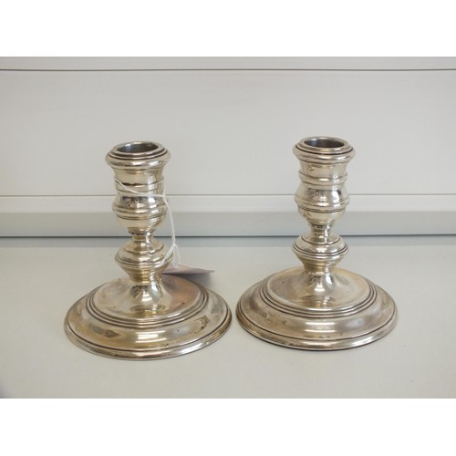 130 - A PAIR OF STERLING SILVER FILLED BASE CANDLESTICKS - LONDON HALLMARKS, RICHARD COMYNS c1978, Height ... 