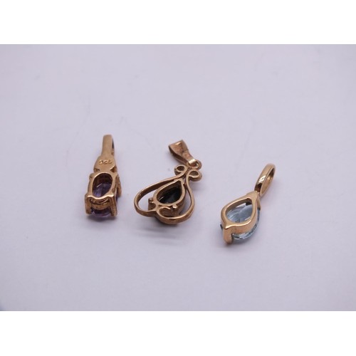 24 - 3 X 9ct Gold Sapphire, Topaz & Amethyst Pendants (1.6g)