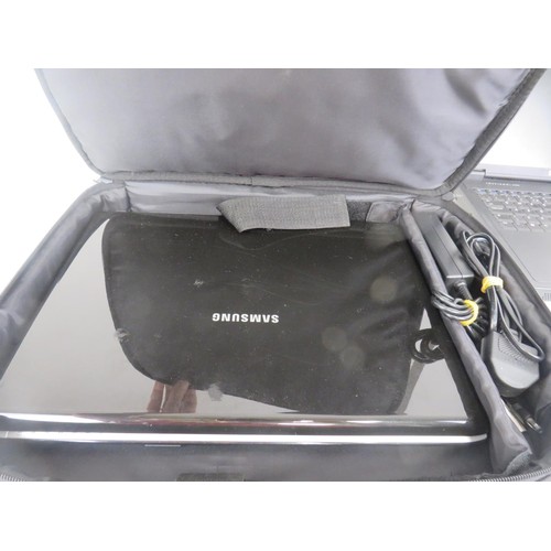 105 - SAMSUNG LAPTOP and DELL LAPTOP BOTH WITH CARRY CASES - AS FOUND