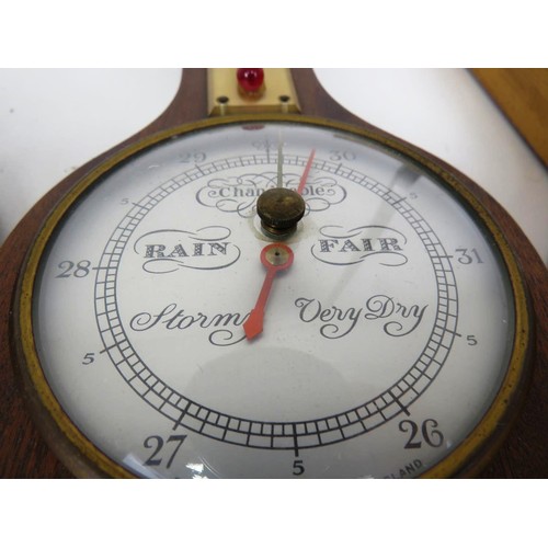 110 - THREE WOOD CASED WALL HANGING BAROMETERS