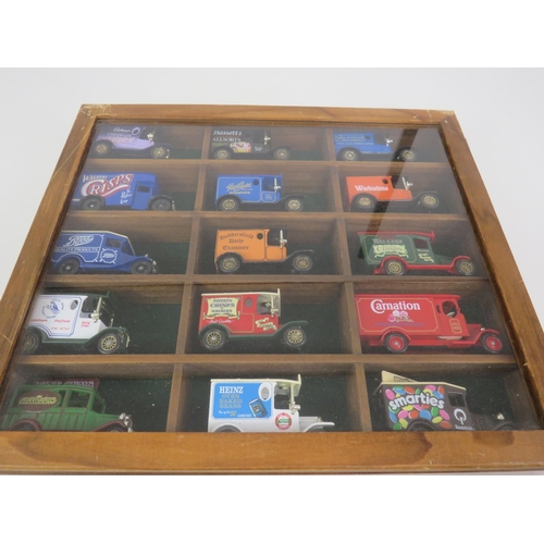 188 - WOOD AND GLASS DISPLAY CASE WITH 15 LLEDO DIECAST ADVERTISING VANS