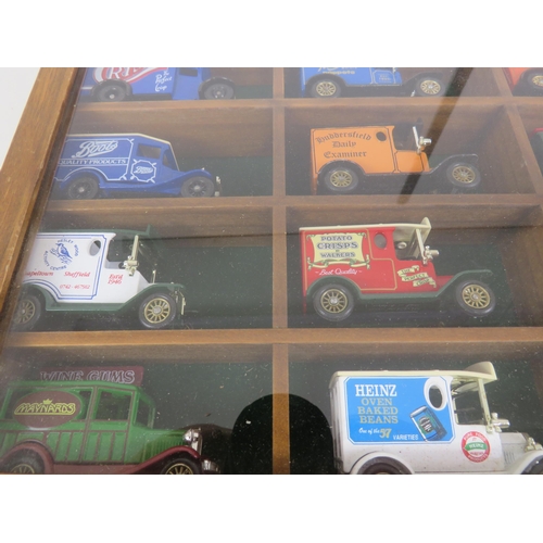 188 - WOOD AND GLASS DISPLAY CASE WITH 15 LLEDO DIECAST ADVERTISING VANS