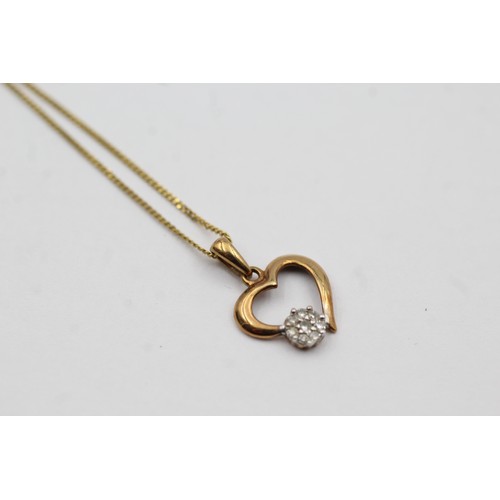 400 - 9ct gold diamond heart pendant on chain (1.3g)