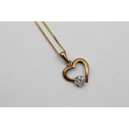 400 - 9ct gold diamond heart pendant on chain (1.3g)