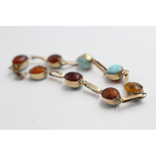 410 - 9ct gold amber and larimar bracelet (10g)