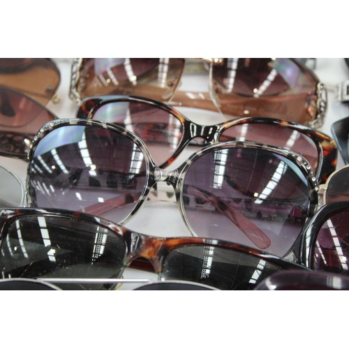 411 - 50 x Assorted SUNGLASSES Inc Carolina Herrera, Katherine Hamnett, D&G etc