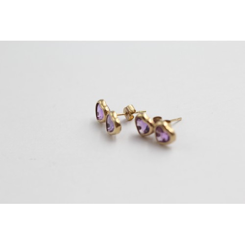 456 - 9ct gold amethyst twin hearts stud earrings (0.7g)