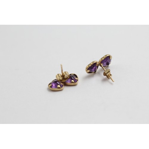 456 - 9ct gold amethyst twin hearts stud earrings (0.7g)